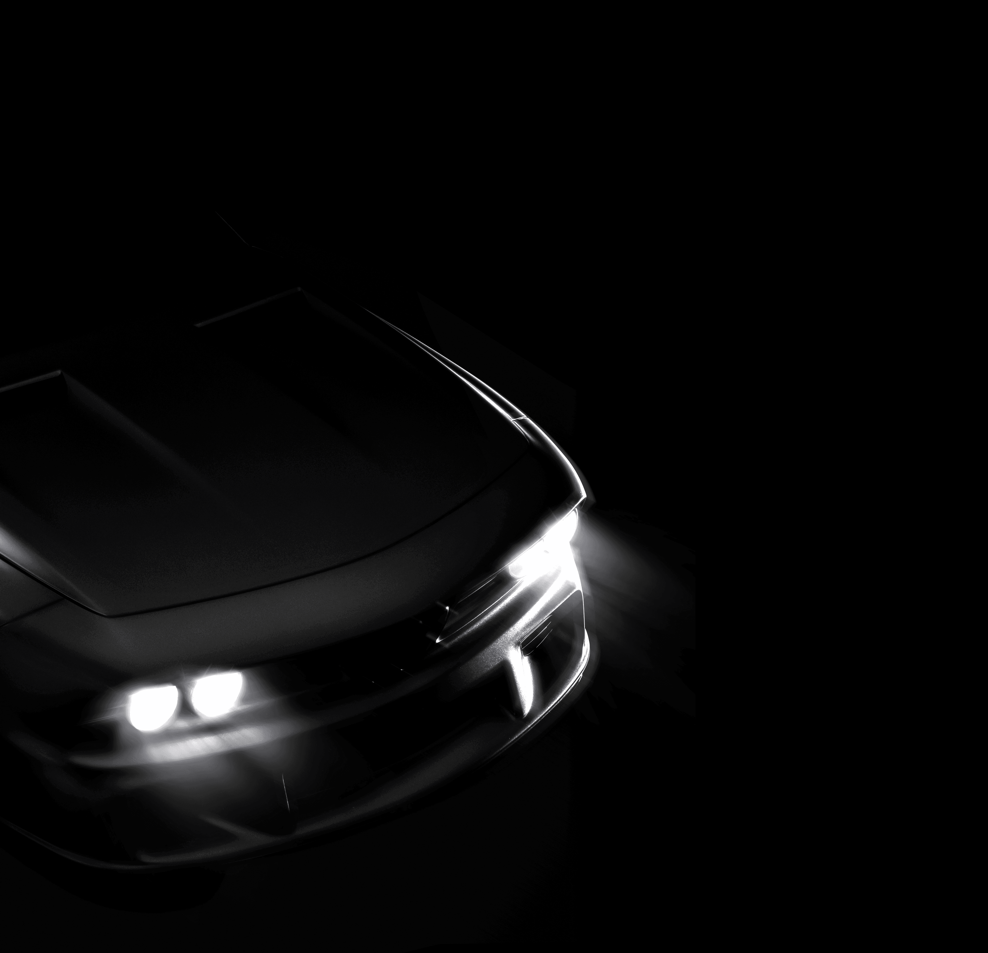 Riverti front view with illuminated headlights emerging from darkness